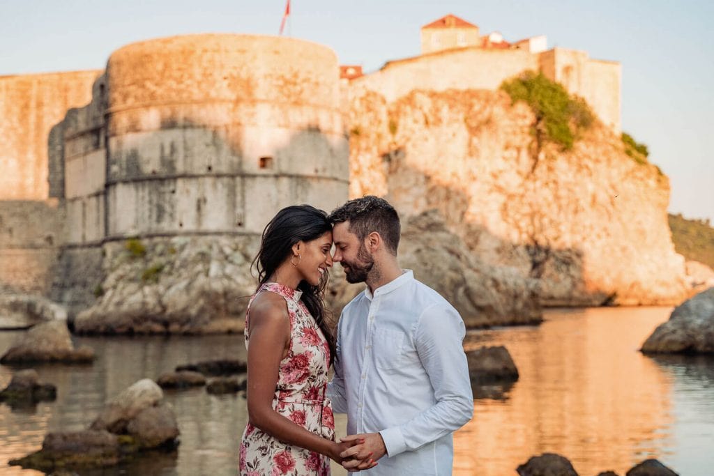 Bokar fort serving as a background for a beatuiful photo of a couple getting ready for a surprise proposal